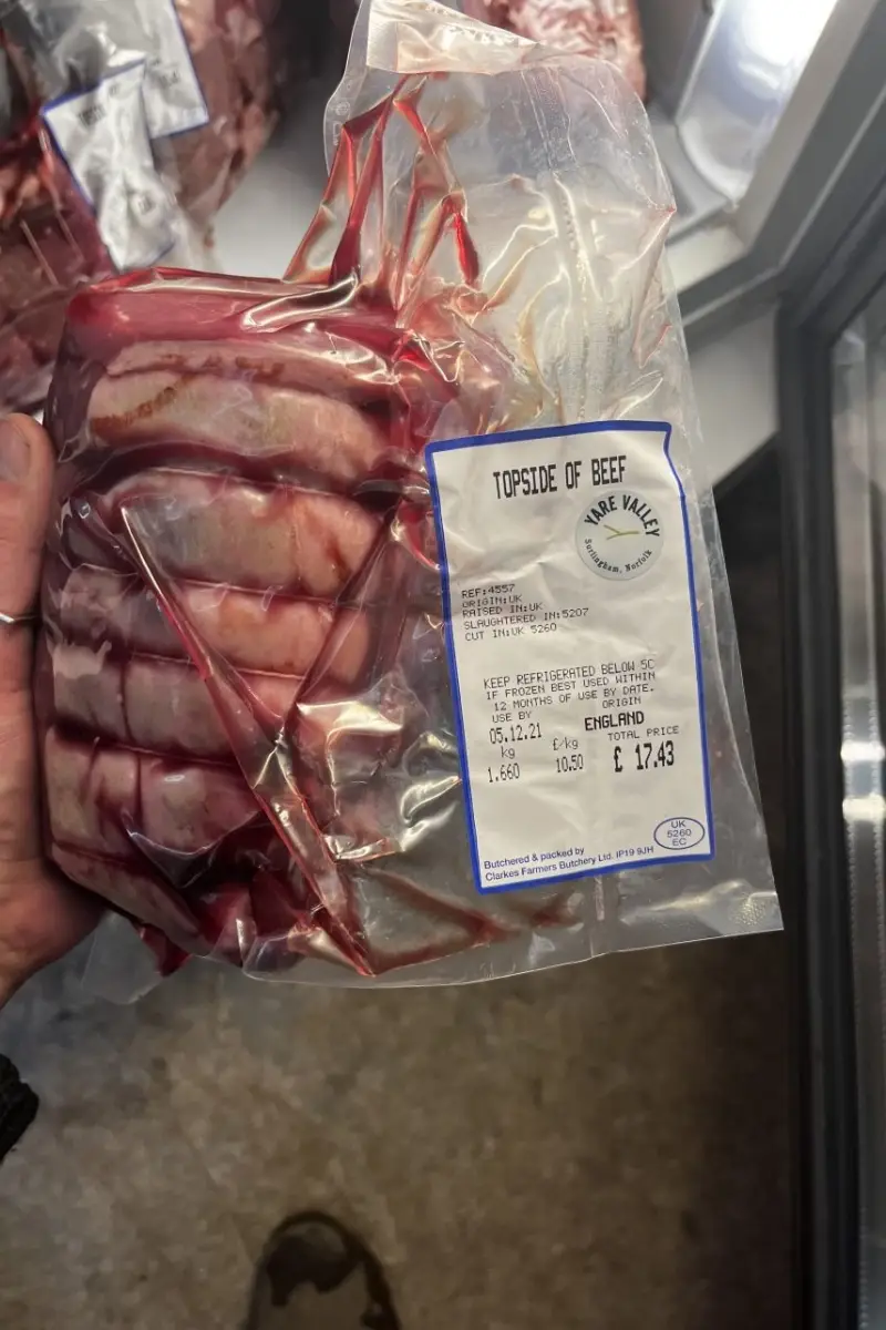 Vacuum packed topside of beef from Yare Valley Farm Shop, labelled and displayed in a chilled cabinet.